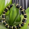 vòng tay san hô bọc vàng18k
