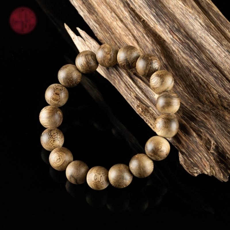 Mặt dây trầm hương mini tròn, vân dầu đẹp, phong thủy tốt