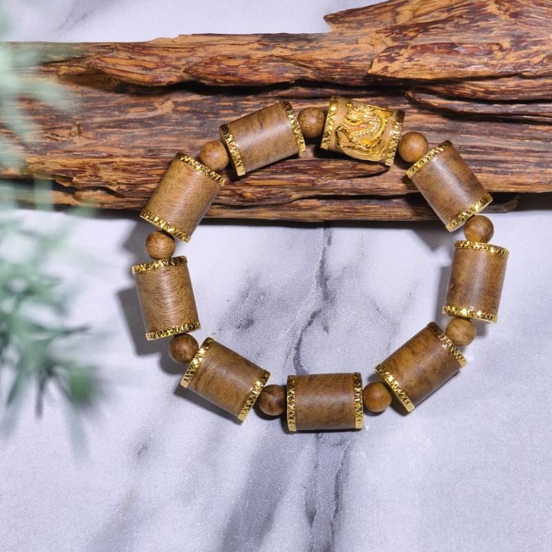 Vòng trầm hương nam cao cấp chạm khắc rồng vàng mang lại may mắn